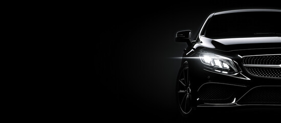 Naklejka premium Luxury black car with headlights on against black background. Generative ai