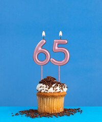 Candle number 65 - Birthday card with cupcake on blue background
