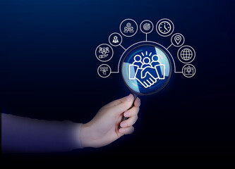 the concept of global partnerships, highlighting interconnected icons floating above the speaker's hand, and discusses business collaboration strategies.