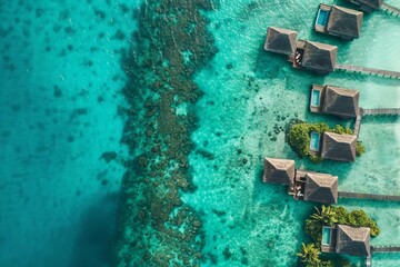 luxury tropical resort aerial view of overwater bungalows on maldives island turquoise ocean
