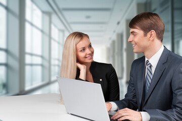 Professional business managers team working sitting at table.