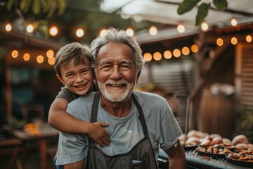 Fototapeta premium Older Man Hugging Young Boy