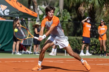 Man Swinging Tennis Racquet at Tennis Ball
