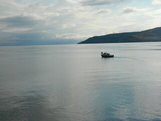 Naklejka premium boat in the sea