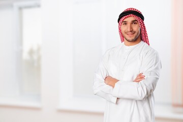 A saudi character standing on room background