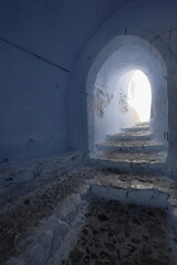 The narrow alleyways and steps of the village of Pyrgos in Santorini, Greece.