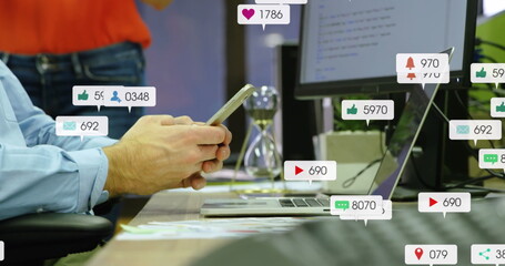 Image of media icons over caucasian businessman using smartphone