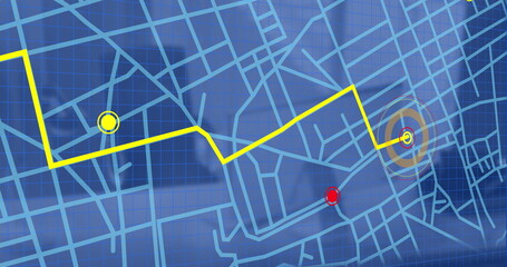 Image of city map with gps over office desk with computer