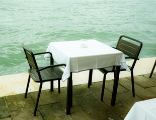 table and chairs on the beach