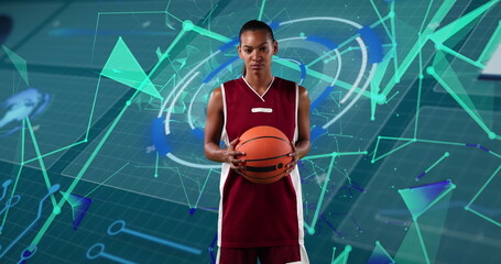 Image of basketball player holding ball over light basketball scientific basketball