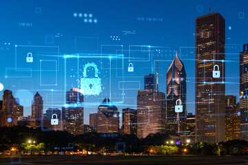 Chicago skyline with futuristic hologram security concept overlay, illuminated cityscape at...