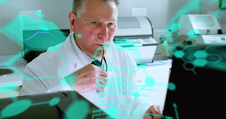 Image of medical data processing on caucasian senior male scientist using computer at laboratory