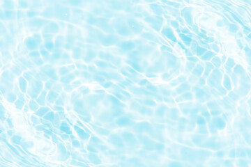 Blue water with ripples on the surface. Defocus blurred transparent blue colored clear calm water...