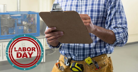 Image of labor day text over caucasian male worker with clipboard