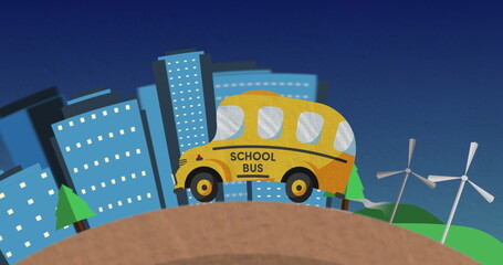 School bus driving through city, passing wind turbines