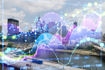 Philadelphia skyline, double exposure with holographic data analytics graph, on sunny city background. Future technology and business concept. Double exposure