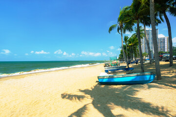 Jomtien Beach in Pattaya, Thailand. Summer vacation in Thailand. Popular destination for recreation, holiday.
