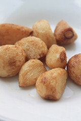 Fried garlic in a plate on the table

