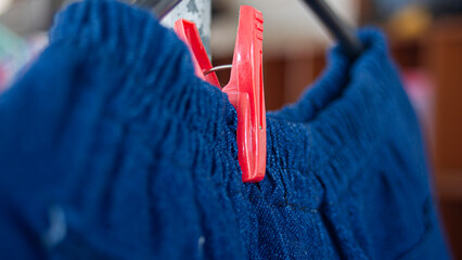 clothes on a hanger in the shop, close-up