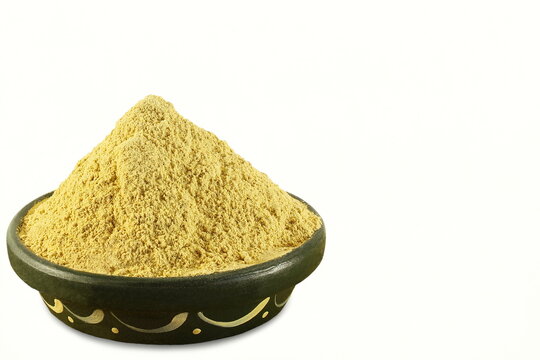 fuller earth or multani mitti powder in bowl for traditional herbal ayurvedic face pack,skin care,white background with copy space