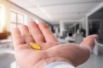 Medical pill in woman hand. Medical concept
