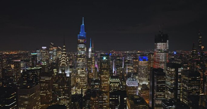 NYC New York Aerial v159 drone flyover Midtown Manhattan capturing dazzling night cityscape with illuminated skyscrapers, birds eye view of Diamond district - Shot with Inspire 3 8k - September 2023