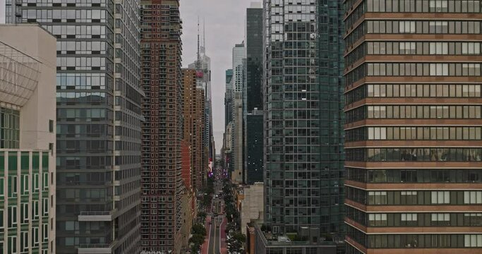 NYC New York Aerial v235 perspective shot drone flyover above 42nd street in between skyscrapers in Hell's Kitchen capturing Midtown Manhattan cityscape - Shot with Inspire 3 8k - September 2023