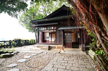 TW-01.30..24: Explore Tamsui's historic Former Japanese Police Officer Dormitory, a preserved building offering a glimpse into Japanese colonial architecture and the area's police force history.