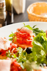 Bruschetta with tomato and ham