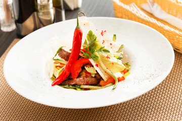 salad with meat in cafe