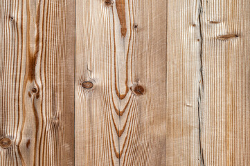 Texture of planed wood board as background.