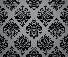 Floral pattern. Vintage wallpaper in the Baroque style. Seamless vector background. Gray and black ornament for fabric, wallpaper, packaging. Ornate Damask flower ornament