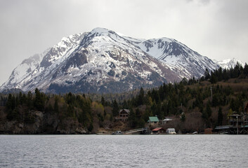 Snowcapped mountain next to Halibut Cove in the Kachemak bay near Homer Alaska United States