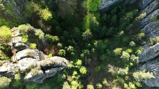 Elbe Massif Rock Formation Reveals Bastei Bridge Near Rathen In Saxon Switzerland, Germany. Aerial Drone Shot