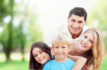 Obraz premium Happy young Family with children outdoor