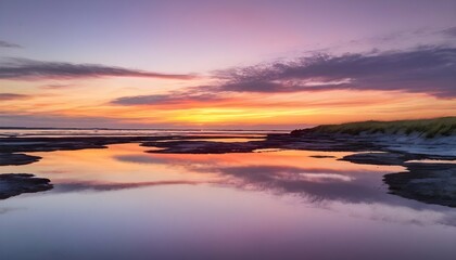 A colorful sunset reflected in the calm waters of upscaled_4