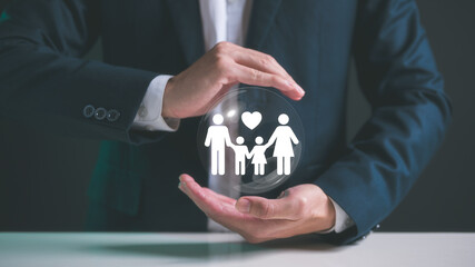 symbol of life insurance Businessman protective gesture complements young family. Health insurance icons, reinforcing family life insurance
