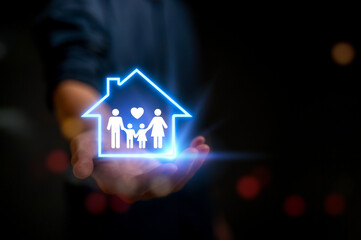 symbol of life and home insurance, Businessman holding virtual house protective gesture complements young family. Health insurance icons, reinforcing family life insurance