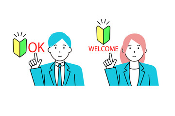 初心者マークを指さすビジネスマンとビジネスウーマン