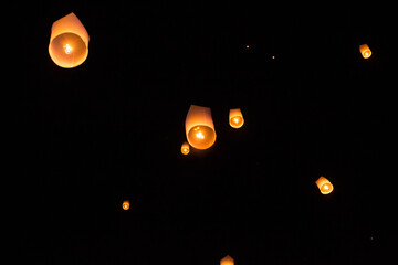 Paper chinese lanterns in night sky for Chiang Mai lantern festival