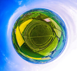 Aerial 360 VR Tiny Planet shot of Figsbury Rings. Iron age hill fort near Salisbury