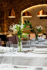 vase with flowers in the restaurant