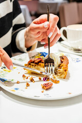 woman eating dessert in the restaurant