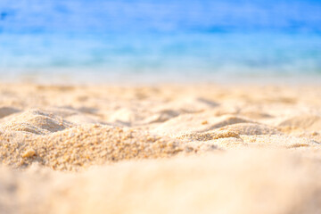 Nature of the beach and sea Summer with sunshine, sandy beaches, clear blue waters sparkling against the blue sky. On an island with good ecology and environment Background for summer vacation concept