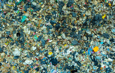 Aerial view, piles of garbage, plastic bottles and garbage. waste sorting facility Concept of waste...