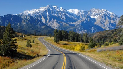 Fototapeta premium Serene Mountainous Scenery with Winding Road
