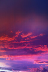 Obraz premium Beautiful sunset sky above clouds with dramatic light. Cabin view from airplane