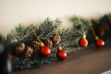 Christmas background with fir tree and decoration on dark wooden board