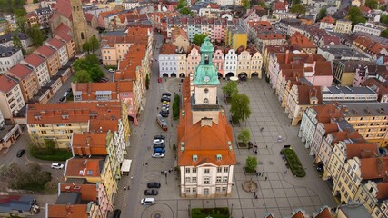 Drone shot showcasing Jelenia Góra's marketplace and historic town hall.