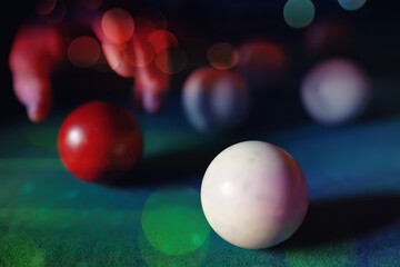 Billiard balls and cue on pool table. Russian billiards. Close-up of items for the game. Background...
